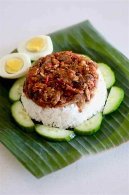  Nasi Lemak: Una Sinfonia di Sapori Tropicali e Cremosità Riso!